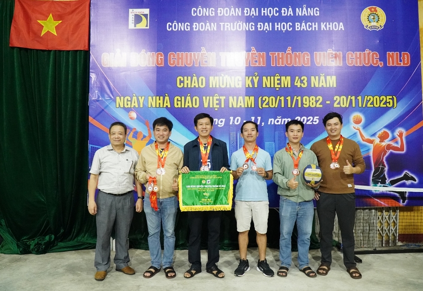 A group of men standing in front of a banner

AI-generated content may be incorrect.