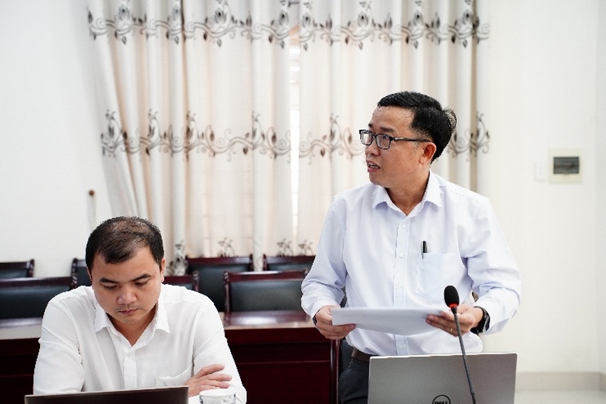 A person standing in front of a microphone and a person standing in front of a computerAI-generated content may be incorrect.