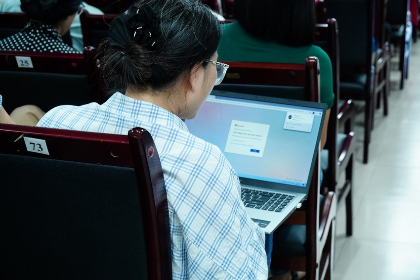 A person sitting in a chair using a computer

AI-generated content may be incorrect.
