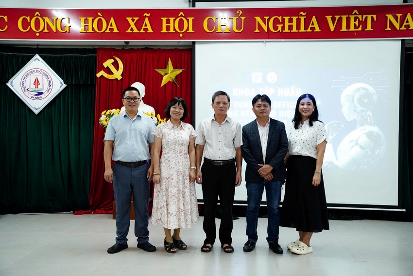 A group of people standing in front of a stage

AI-generated content may be incorrect.