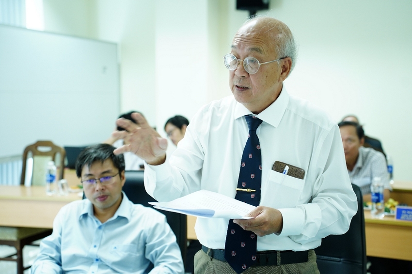 A person in a white shirt and tie holding a piece of paper

AI-generated content may be incorrect.