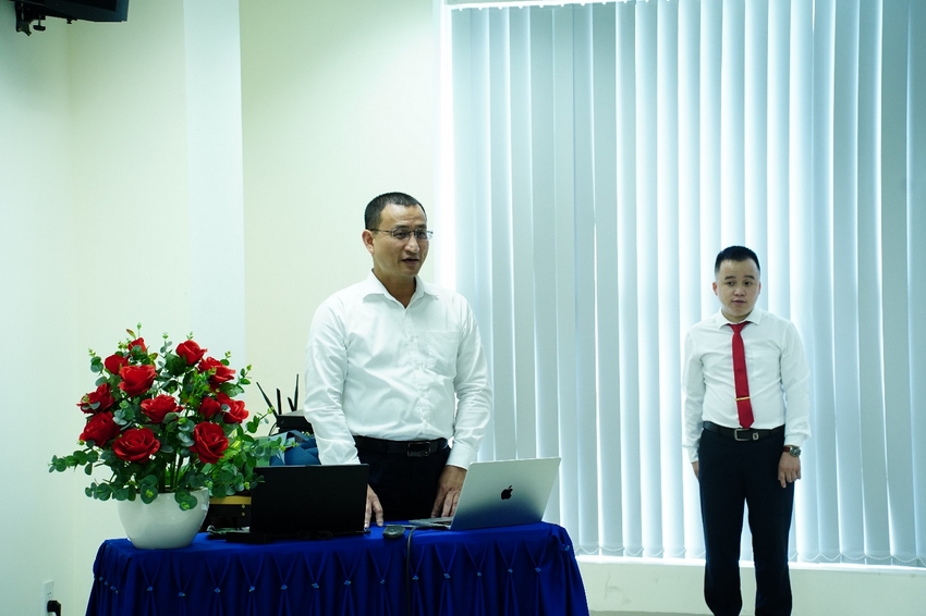 A person and child standing next to a table with a computer

AI-generated content may be incorrect.