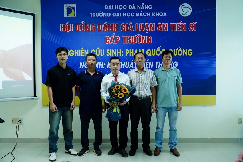 A group of men standing in front of a banner

AI-generated content may be incorrect.