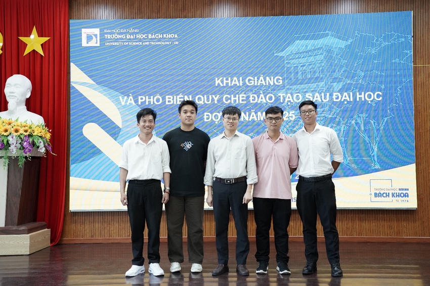 A group of men standing in front of a large screen

AI-generated content may be incorrect.