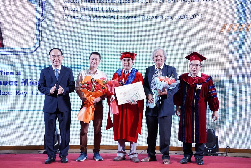 A group of people standing in front of a screen

AI-generated content may be incorrect.