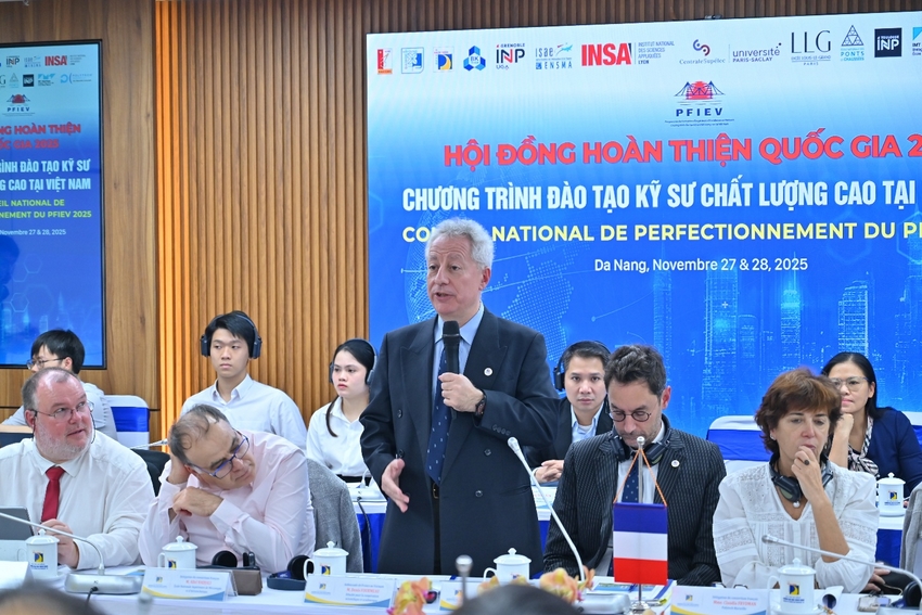 A person in a suit speaking into a microphone

AI-generated content may be incorrect.