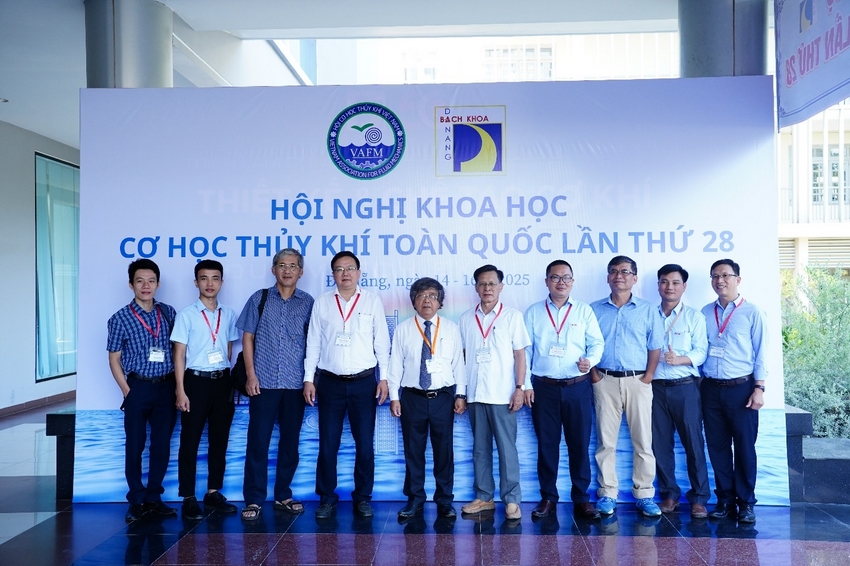 A group of people standing in front of a sign

AI-generated content may be incorrect.