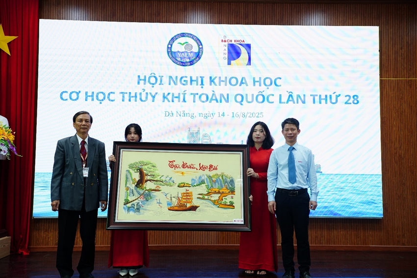 A group of people holding a framed picture

AI-generated content may be incorrect.