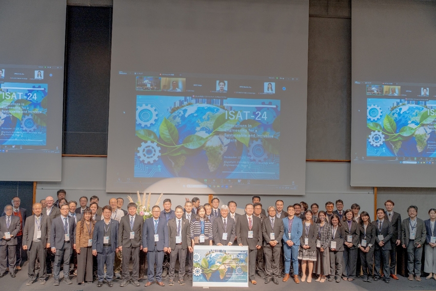 A group of people standing in front of a projection screen

AI-generated content may be incorrect.