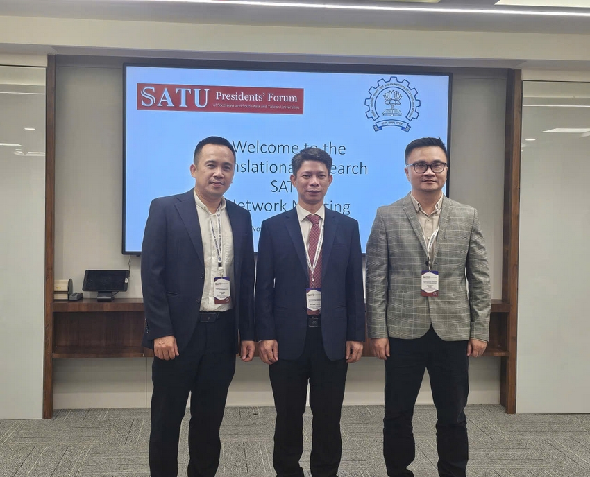 A group of men standing in front of a large screen

AI-generated content may be incorrect.