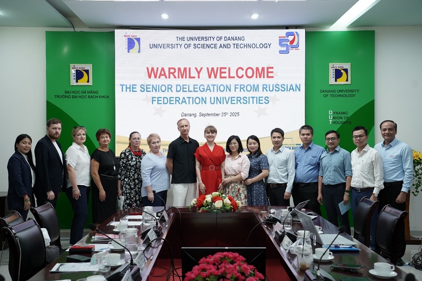 A group of people standing in front of a large banner

AI-generated content may be incorrect.