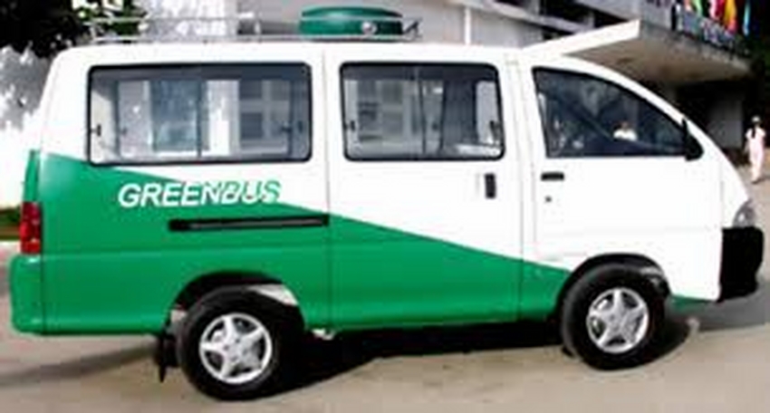 A small green and white van

Description automatically generated with low confidence