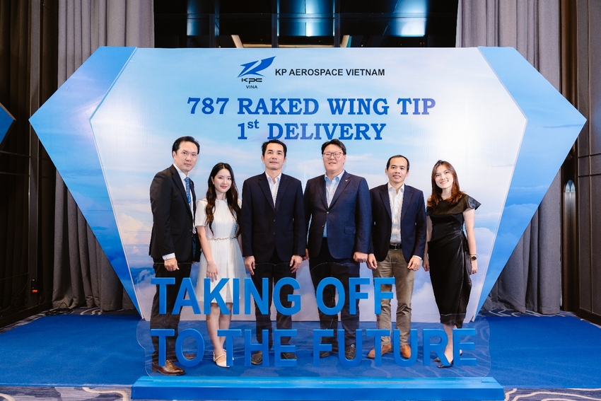 A group of people standing in front of a sign

AI-generated content may be incorrect.