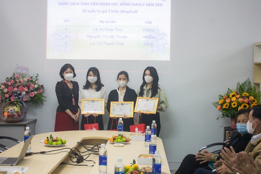 A group of women holding certificates

Description automatically generated with medium confidence