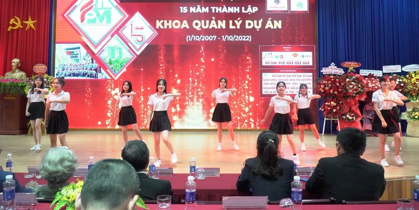 A group of women performing on a stage
Description automatically generated with medium confidence