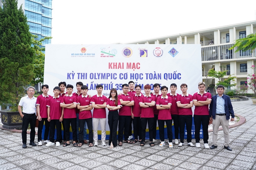 A group of people standing together in front of a sign

AI-generated content may be incorrect.