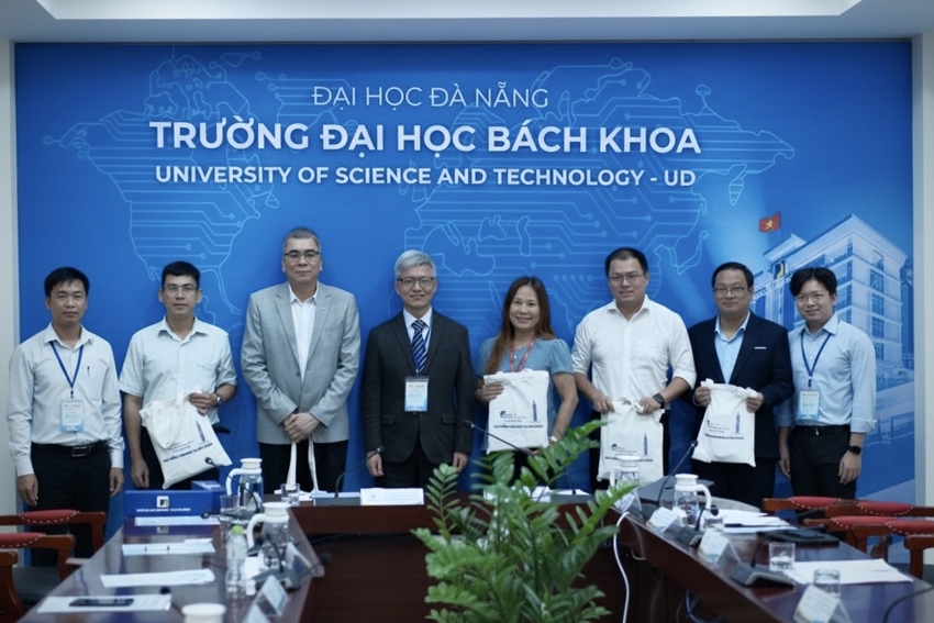 A group of people standing in front of a blue wall

AI-generated content may be incorrect.